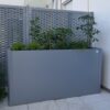 Plantenbak op balkon als afscheiding